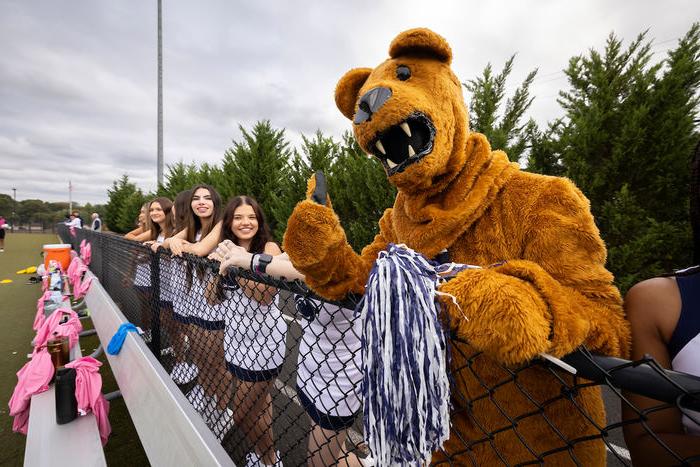 Nittany lion standing with Penn State Abington (near Philadelphia) cheerleaders